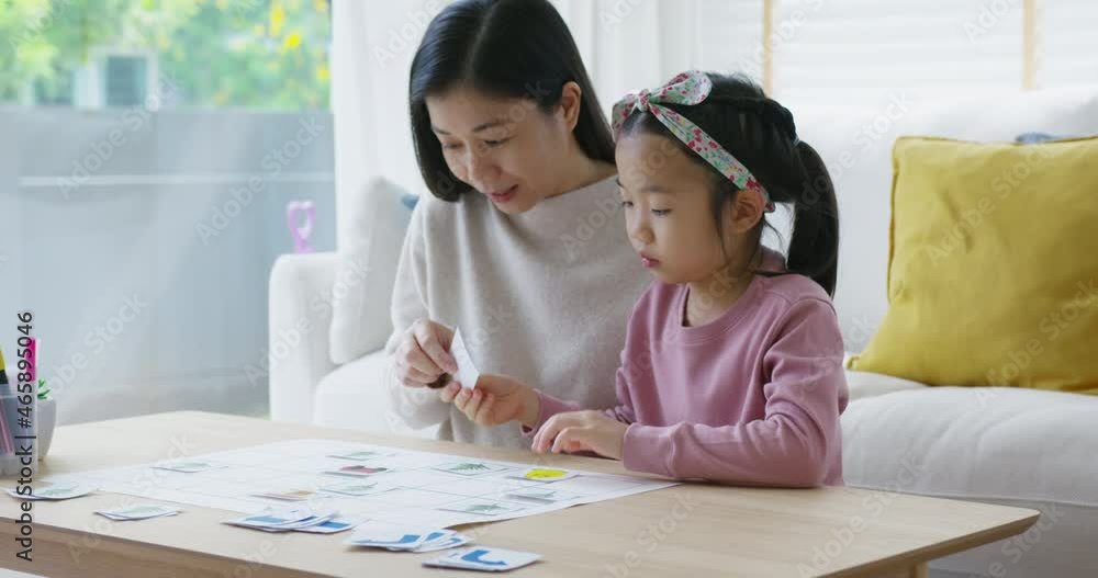 Little cute girl play and learn offline class computer language game Unplugged Coding computing concept with mom for asia kindergarten gen Z smart kids sit at table home sofa. STEM STEAM ICT skill. Little cute girl play and learn offline class computer language game Unplugged Coding computing concept with mom for asia kindergarten gen Z smart kids sit at table home sofa. STEM STEAM ICT skill.