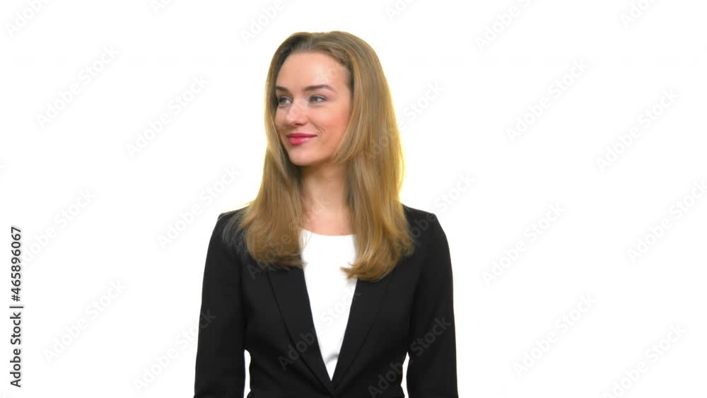 A beautiful woman posing for a professional portrait picture and turn her head a side with a smile. A confident woman wearing a suit with long hair proud of her makeup and posing for a passport photo. A beautiful woman posing for a professional portrait picture and turn her head a side with a smile. A confident woman wearing a suit with long hair proud of her makeup and posing for a passport photo.