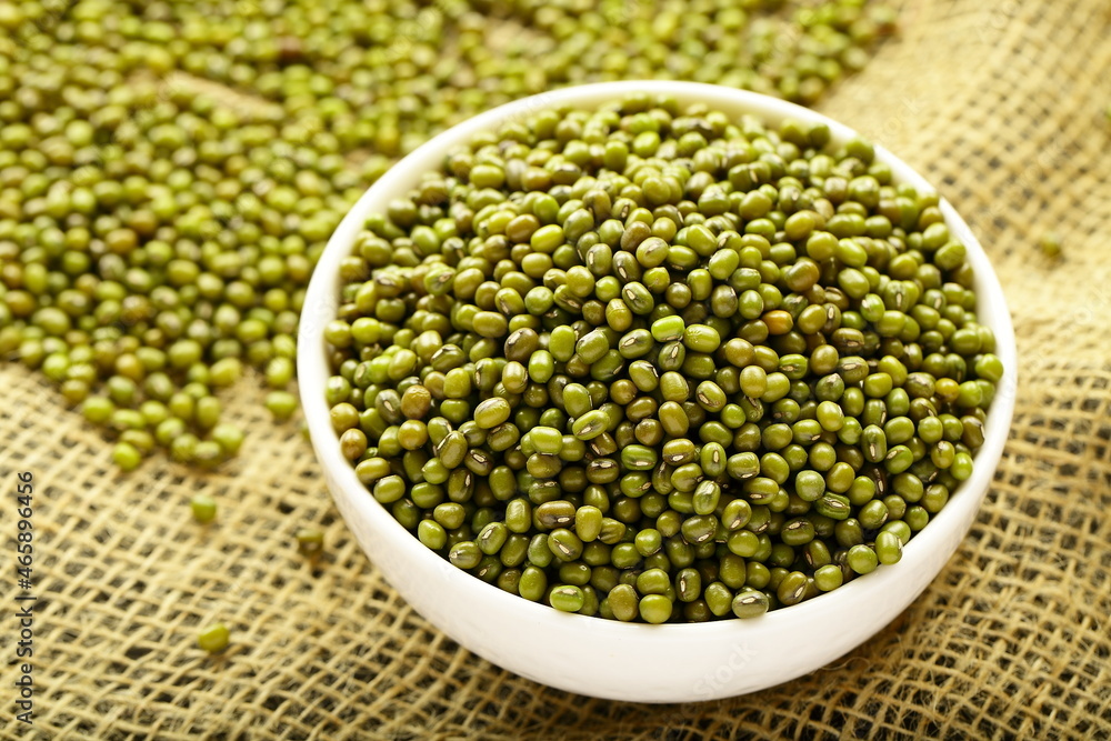 Bowl of organic mung beans, Asian vegan diet foods. Bowl of organic mung beans, Asian vegan diet foods.