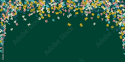 Falling letters of English language. Pastel flying words of Latin alphabet. Foreign languages study concept. Memorable back to school banner on blackboard background.