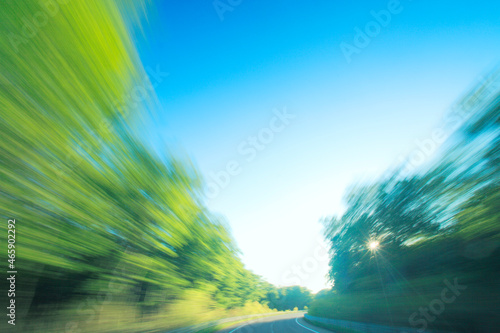 八甲田山の新緑のブナ林と夕日の木もれ日と国道394号線, 青森市,青森県