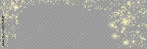 Sparkling magical dust particles .The dust sparks and golden stars shine with special light. Vector sparkles on a transparent background.