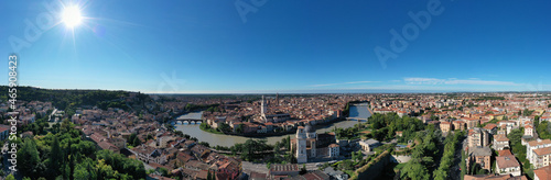 Panoramic top view of Verona city center. Aerial panorama of Verona, Italy. Italian medieval city drone view. Italian churches in the old city aerial view. Historic Italian town panorama top view.
