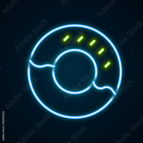 Glowing neon line Donut with sweet glaze icon isolated on black background. Colorful outline concept. Vector