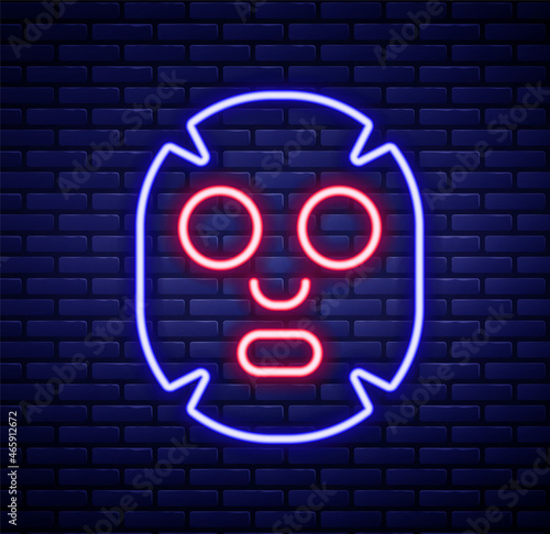 Glowing neon line Facial cosmetic mask icon isolated on brick wall background. Cosmetology, medicine and health care. Colorful outline concept. Vector