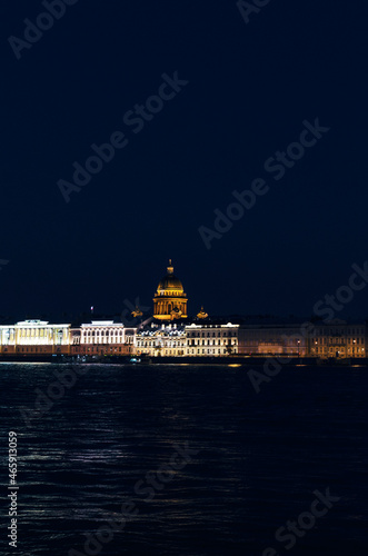 RUSSIA, Saint Petersburg: Scenic sunset cityscape view of the city architecture with Neva river bridges. Evening twightlight St. Isaac's Cathedral architecture 