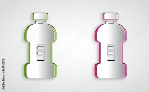 Paper cut Plastic bottle for laundry detergent, bleach, dishwashing liquid or another cleaning agent icon isolated on grey background. Paper art style. Vector