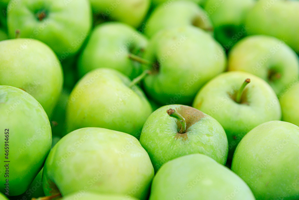 Fresh ripe green apples at the street market. Fresh ripe green apples at the street market.