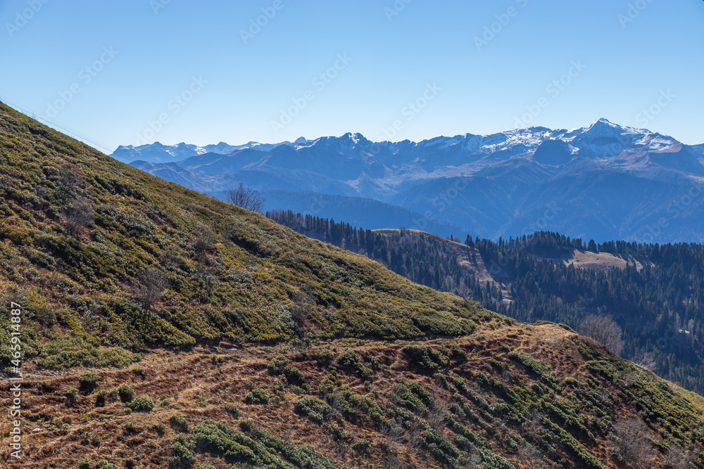 Fototapeta premium Beautiful panorama of the Caucasus mountains on a sunny autumn day
