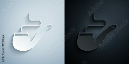 Paper cut Smoking pipe with smoke icon isolated on grey and black background. Tobacco pipe. Paper art style. Vector