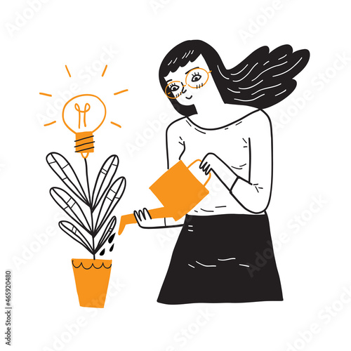 Young woman watering a plant in flowerpot with flowers