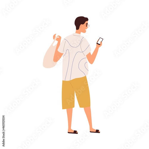 Man walking and holding mobile phone. Person using internet on smartphone on ...