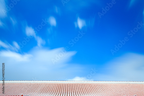 首里城北殿の赤瓦屋根と流れる雲, 那覇市,沖縄県 photo