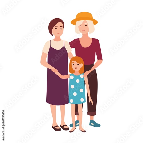 Lesbian couple standing with daughter. Pair of happy young women and their ki...
