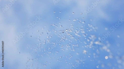 Wallpaper Mural Watering garden with water sprinkle shooting high into sky, isolated on blue sky Torontodigital.ca