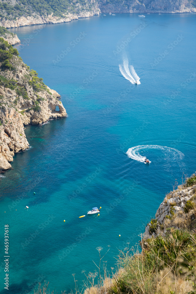 Fototapeta premium motorboat trip on the blue mediterranean sea on a sunny summer day beautiful seascape in Spain