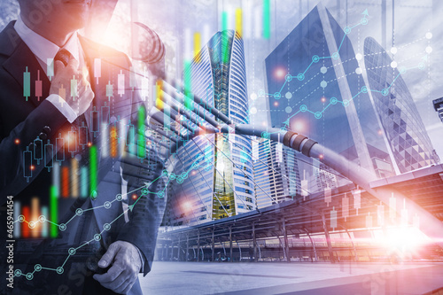 Double exposure picture.photo mix  building city with icons graph and businessman standing.deal,partnership,
Development,meeting,action.Picture concept work woman and business.