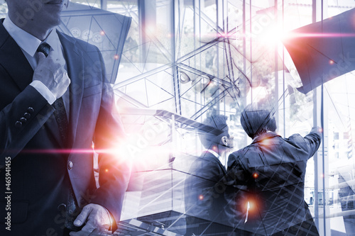 Double exposure picture.photo mix  building city with icons graph and businessman standing.deal,partnership,
Development,meeting,action.Picture concept work woman and business.
