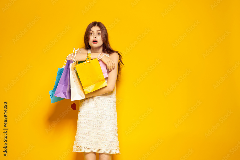 smiling woman shopping entertainment lifestyle yellow background smiling woman shopping entertainment lifestyle yellow background