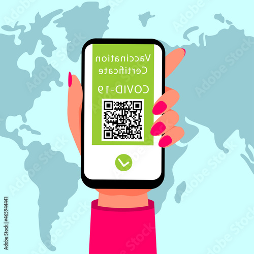 Immunization certificate with qr code on device screen. Smartphone in hand with health passport.
