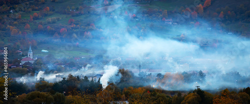 Smoke over rural landscape