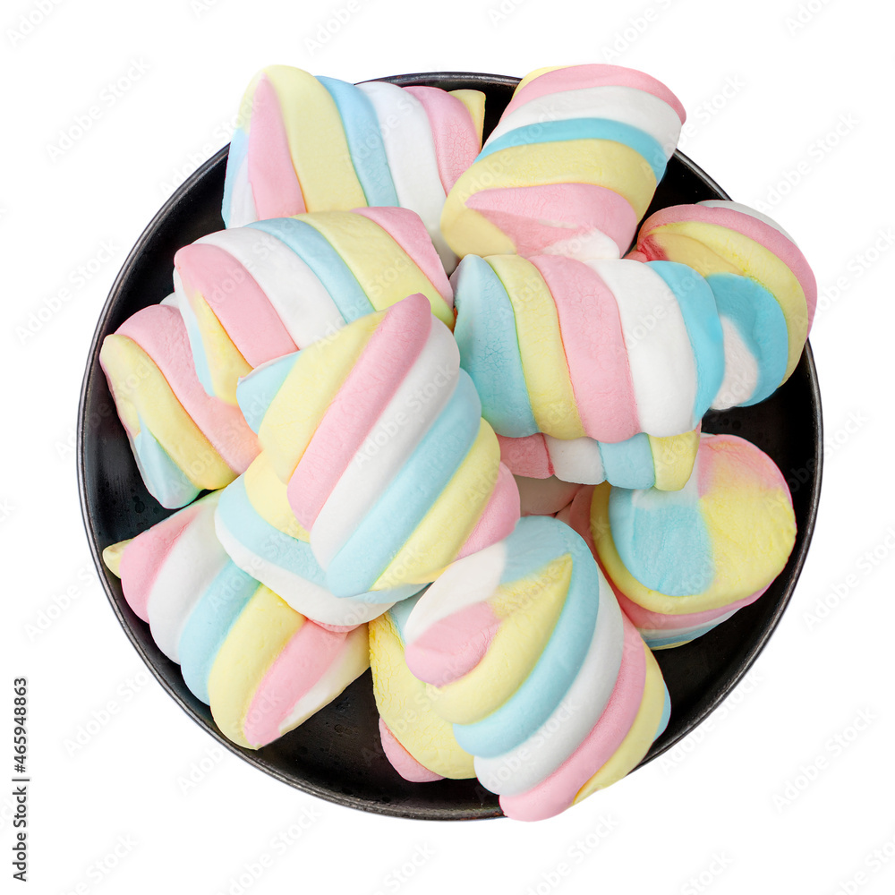 Colorful marshmallows on a black plate isolated on white background. Multi-colored marshmallows closeup.