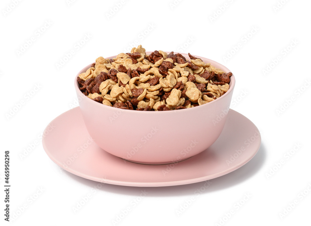 chocolate and honey cornflakes in pink plate on a white background. Morning breakfast with milk chocolate and honey cornflakes in pink plate on a white background. Morning breakfast with milk