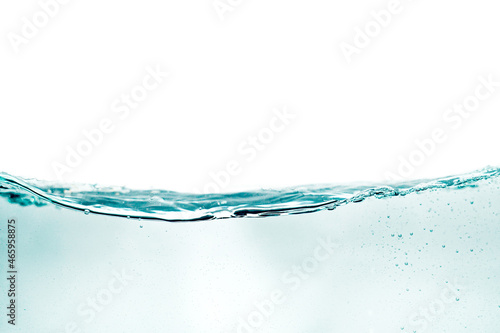 the water from the side view. the side view of the water surface isolated on white. abstract liquid nature texture.