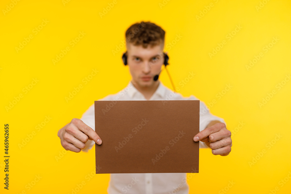 Young businessman is showing the word. Your text here Young businessman is showing the word. Your text here