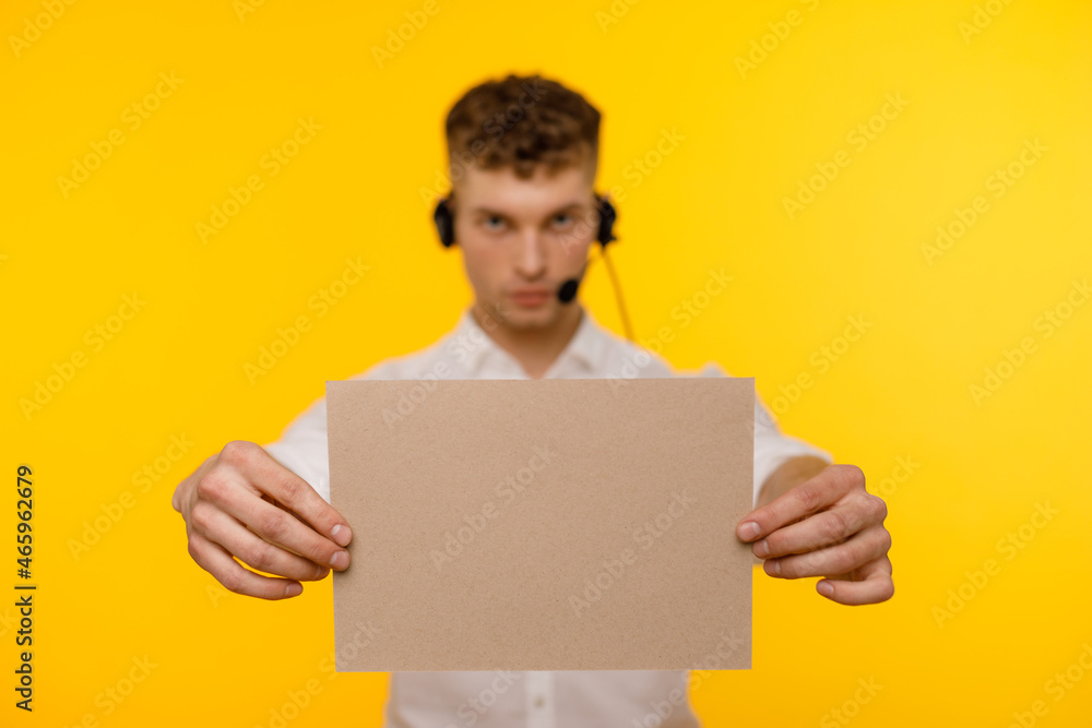 Young businessman is showing the word. Your text here Young businessman is showing the word. Your text here