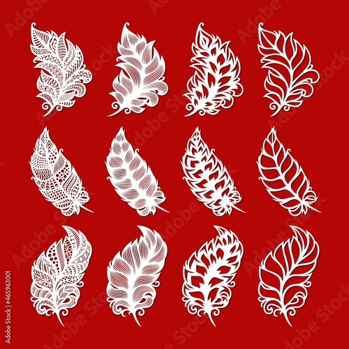 Set of decorative stylized feathers, leaves, quill. Openwork ornament of curls, beautiful folk motives, ethnic patterns. Template for plotter laser cutting of paper, metal engraving, wood carving, cnc