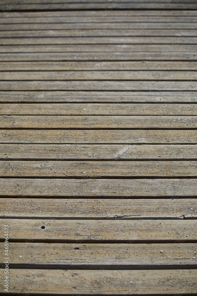 Wood texture. Floor of separated woods with cracks and full of sand. Beach path. Texture for matte painting. Wood texture. Floor of separated woods with cracks and full of sand. Beach path. Texture for matte painting.