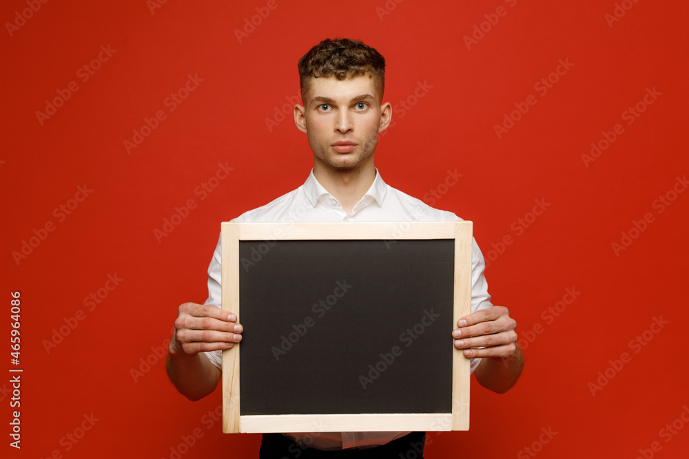 Young businessman is showing the word. Your text here Young businessman is showing the word. Your text here