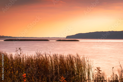 Autumn sunset landscape over the Narew River
