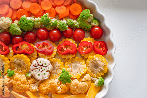 Vegetables for baking in the oven, close-up. Homemade casserole of vegetables. Healthy food background, vegan food
