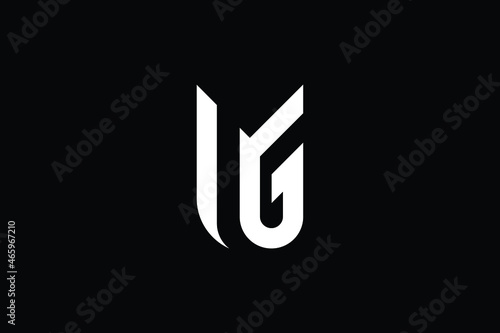 MG logo letter design on luxury background. GM logo monogram initials letter concept. MG icon logo design. GM elegant and Professional letter icon design on black background. M G GM MG