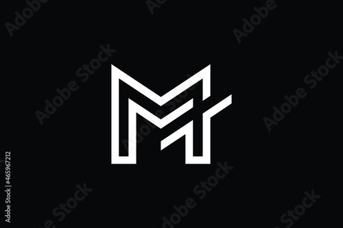 TM logo letter design on luxury background. MT logo monogram initials letter concept. TM icon logo design. MT elegant and Professional letter icon design on black background. T M MT TM