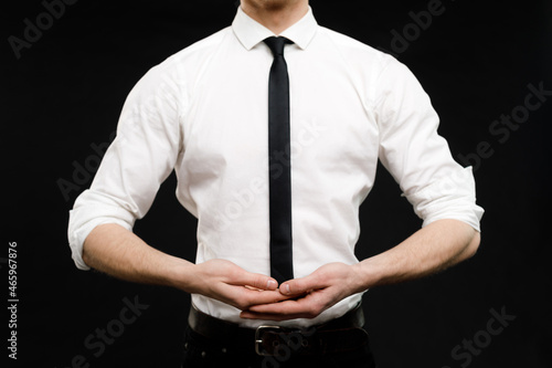 Young businessman is showing the word. Your text here