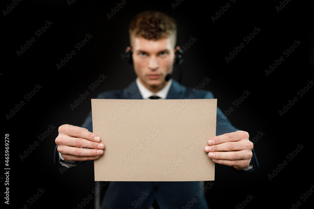 Young businessman is showing the word. Your text here Young businessman is showing the word. Your text here