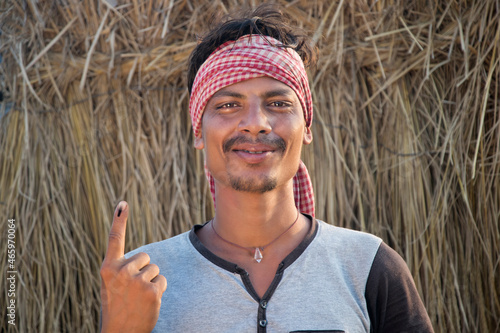 Photography Portrait of farmer with voters mark on finger