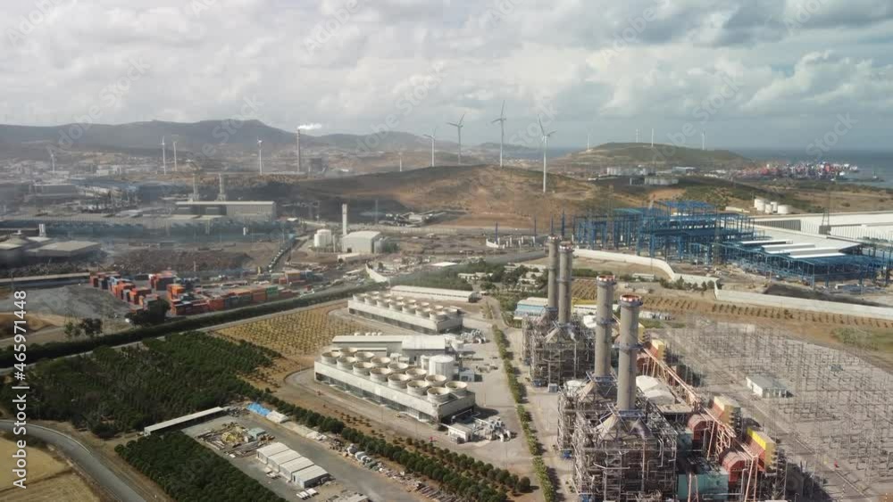 Aerial view of large industrial gas power plant in countryside. Top view. Complex with pipelines and chimneys. High quality 4k footage Aerial view of large industrial gas power plant in countryside. Top view. Complex with pipelines and chimneys. High quality 4k footage