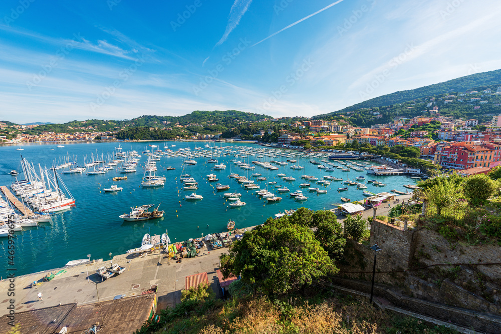 Port with many boats moored in the Gulf of La Spezia. Lerici and San Terenzo village, tourist resorts in Liguria, Mediterranean sea, Italy, Southern Europe.