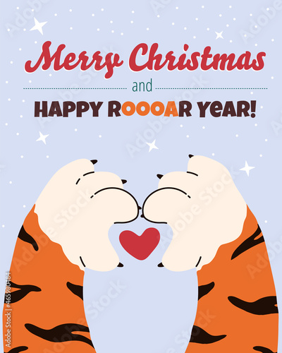 Tiger making heart sign with his paws.Greeting card for christmas and new year.