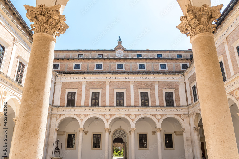 Courtyard of Palazzo Ducale (Ducal Palace) of Urbino home of the Duke of Montefeltro, Marche, Italy, Europe