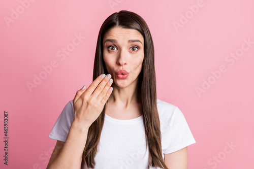 Photo portrait young woman surprised whistle staring isolated pastel pink color background
