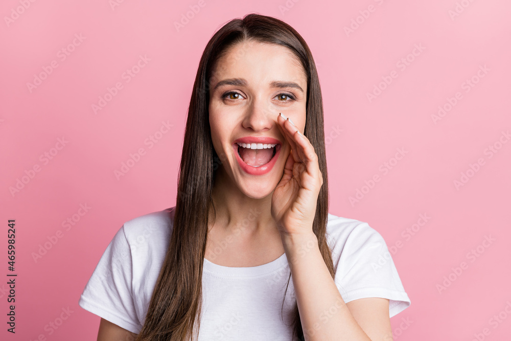 Portrait of attractive cheerful girl saying info ad advert loud speaker isolated over pink pastel color background Portrait of attractive cheerful girl saying info ad advert loud speaker isolated over pink pastel color background