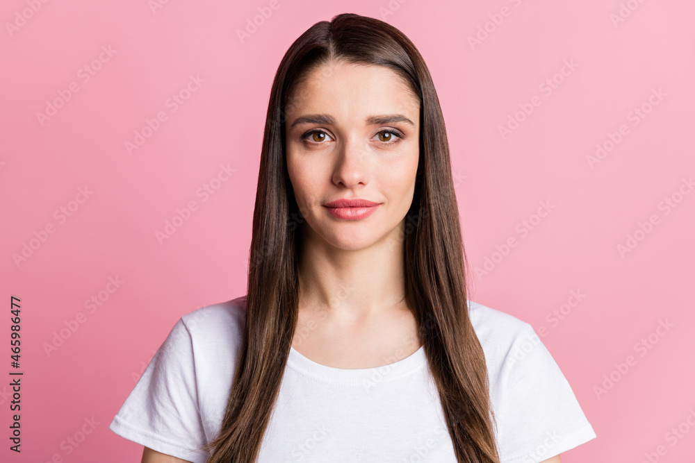 Portrait of attractive calm content long-haired girl with clean clear skin isolated over pink pastel color background