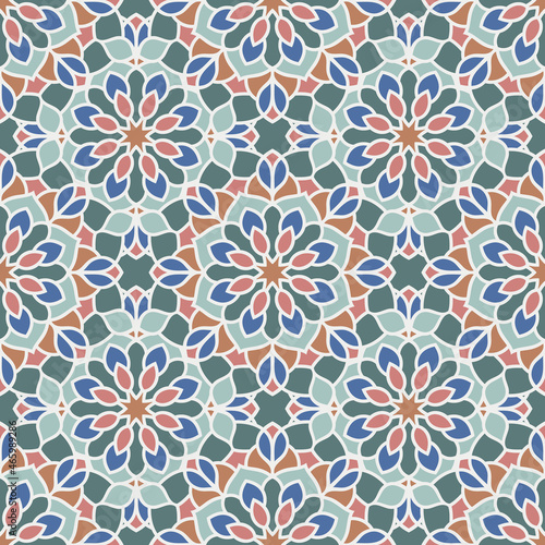 Abstract seamless mandala background. Texture in green and red colors. Oriental pattern for design, fashion print, scrapbooking