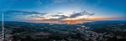 Drone panorama over Istrian Adriatic coast near Porec taken from high altitude at sunset © Aquarius