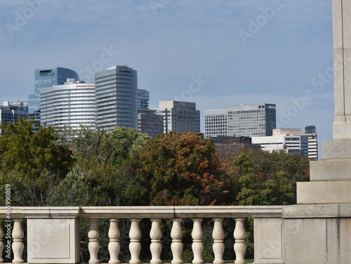 Arlington, Virginia, USA - October 25, 2021: Arlington Skyline as Seen from the Memorial Bridge on a Sunny Fall Afternoon with Bridge’s Concrete Railing in the Foreground